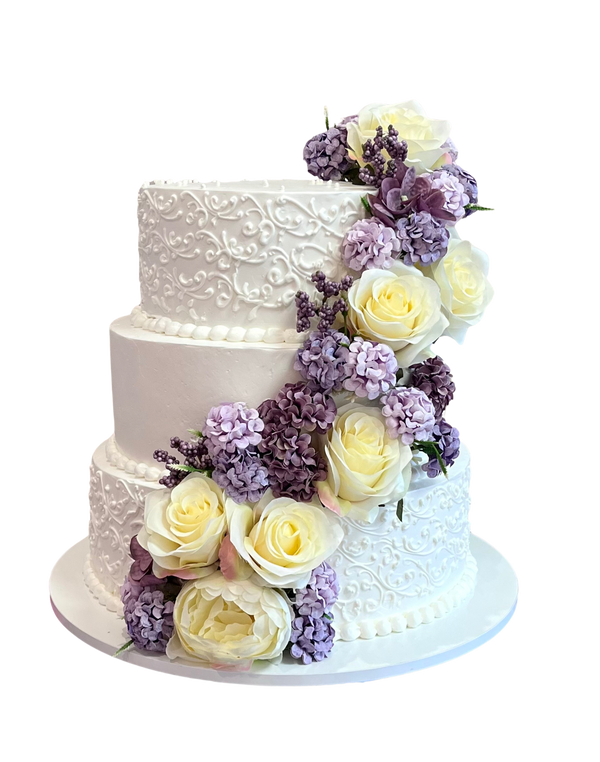Сватбена торта на три етажа с красива диагонална летна от цветя